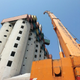 Illustration for article titled This Shipping Container City Above an Old Grain Silo Is Actually a Dorm